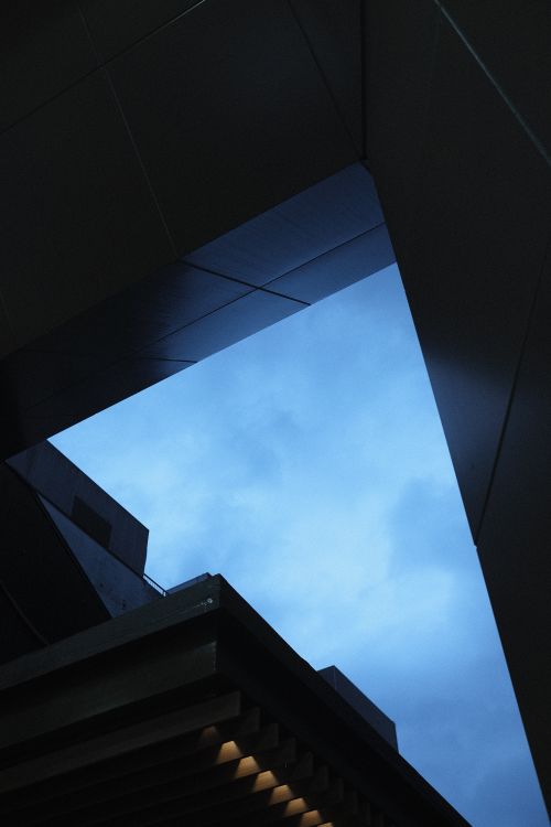 Free Modern architecture framing a view of the sky with geometric design. Stock Photo