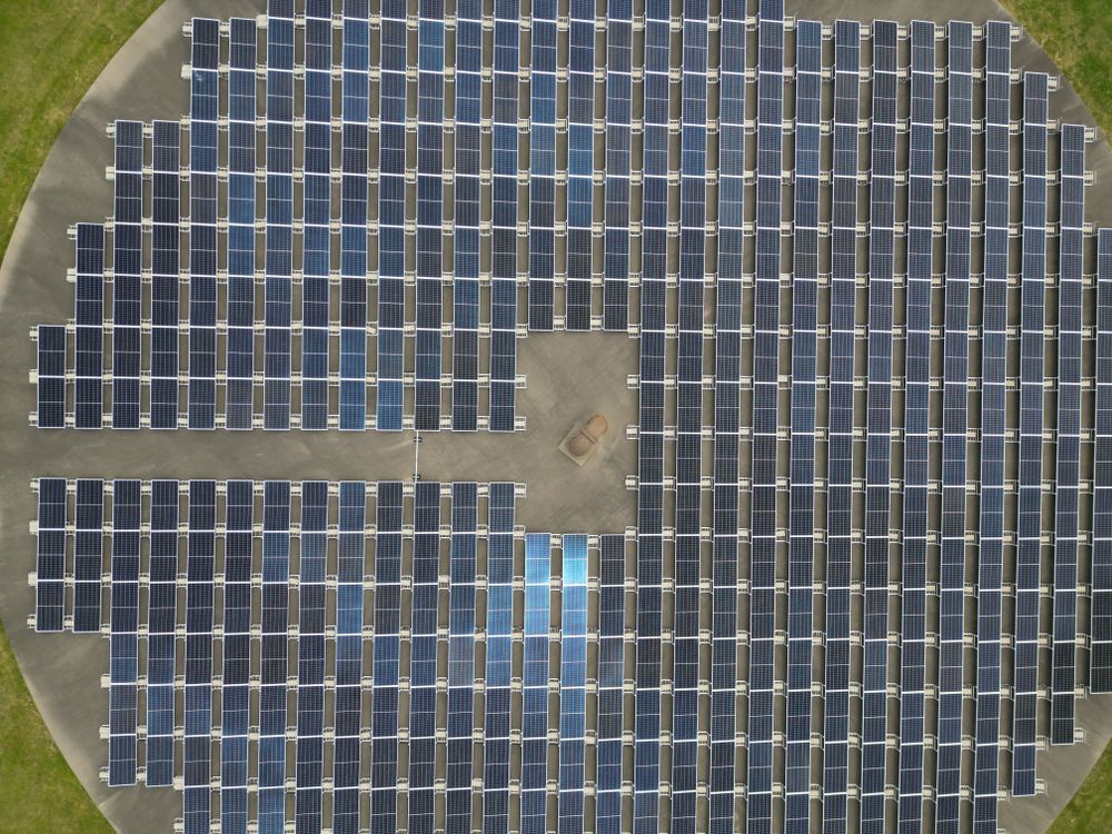 Aerial View of Solar Panel Array Field · Free Stock Photo