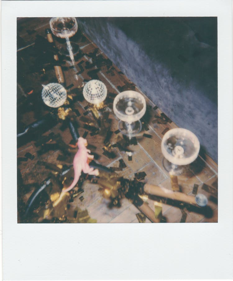 Table With Cocktail Glasses And Confetti