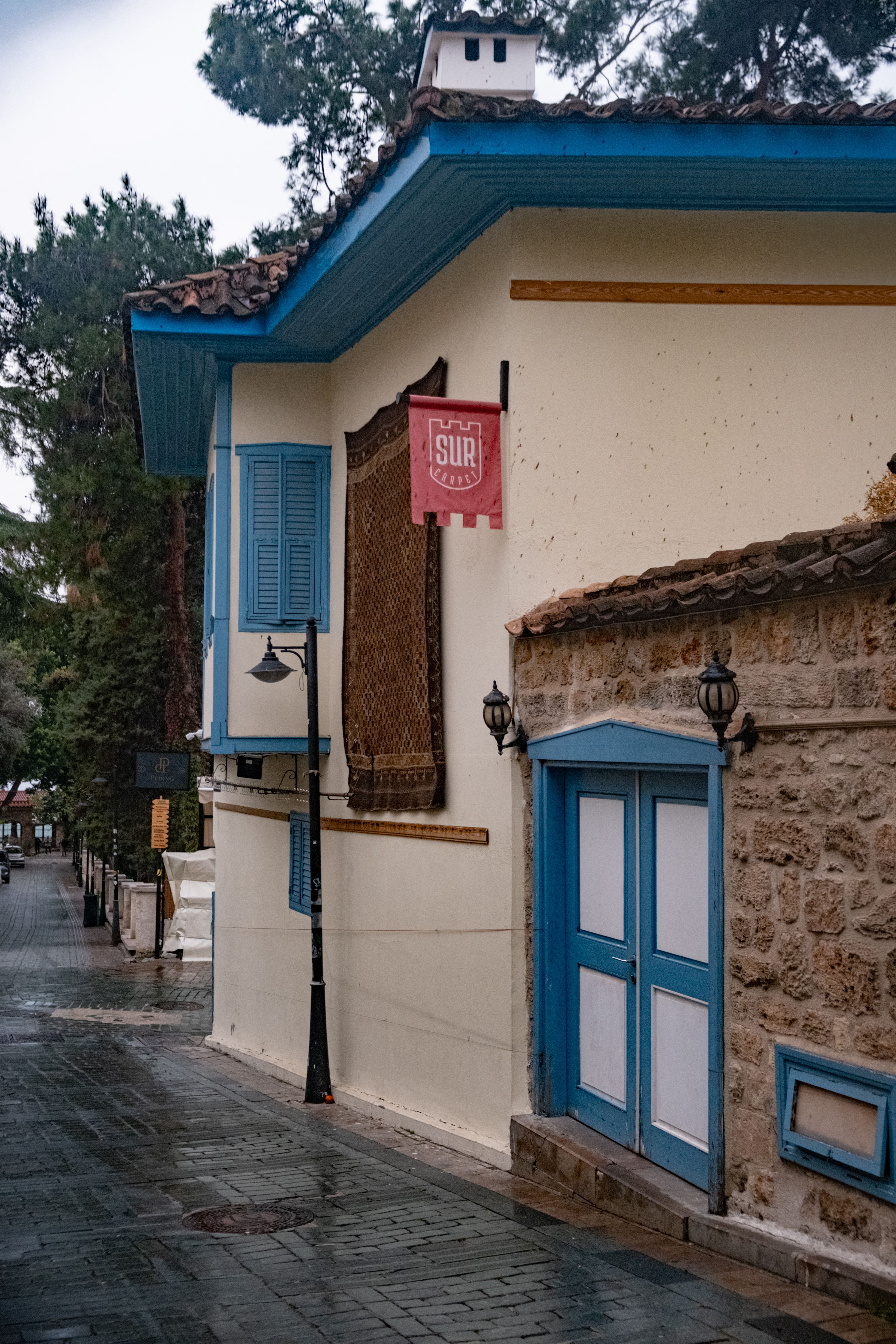Charming Rustic House on Rainy Street · Free Stock Photo