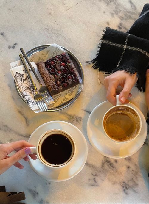 Free Delight in a coffee and cherry cake pairing, perfect cozy cafe scene. Stock Photo