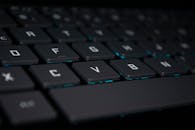 Close-Up of Backlit Keyboard in Dark Setting