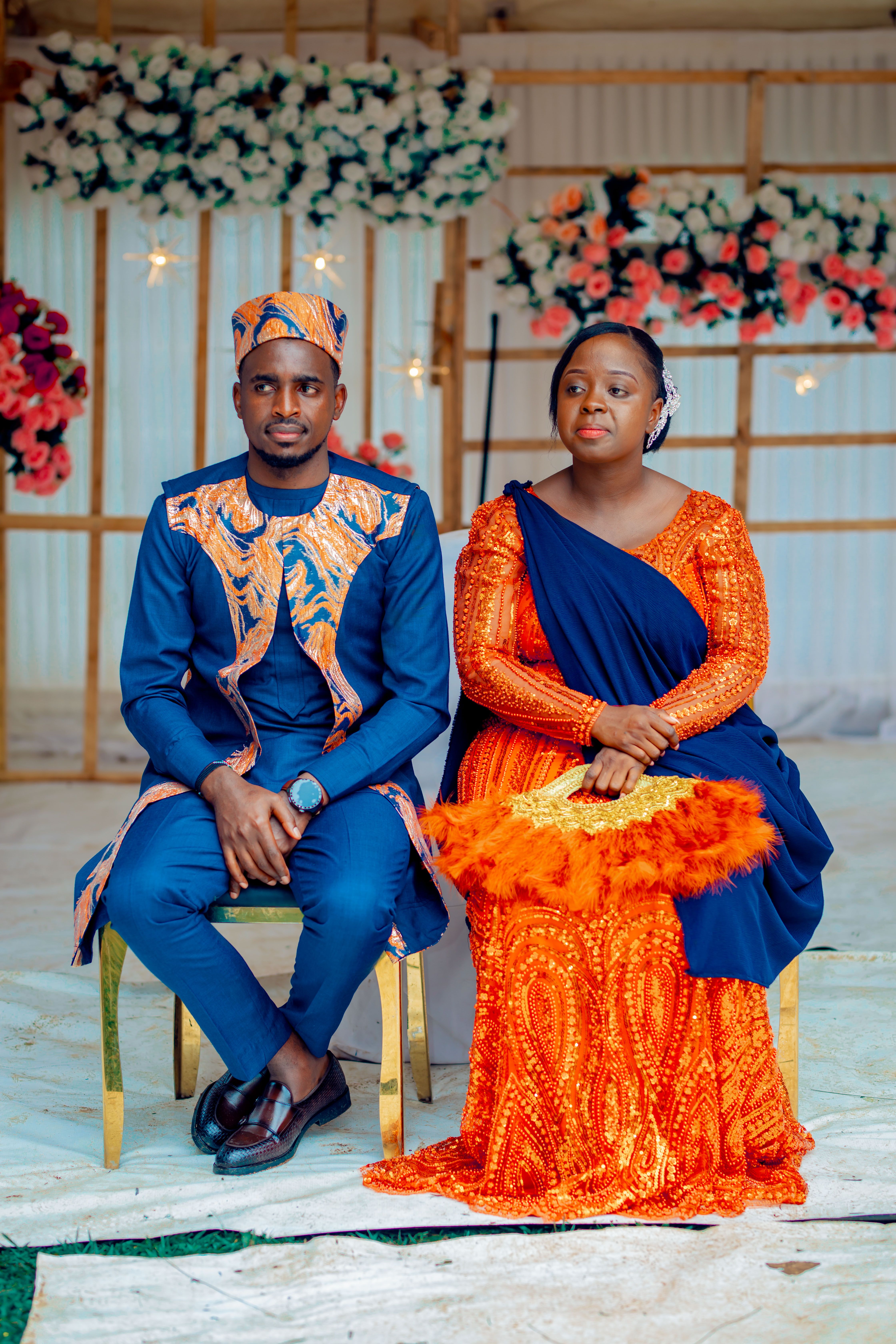 Elegant Couple in Traditional Attire at Celebration · Free Stock Photo