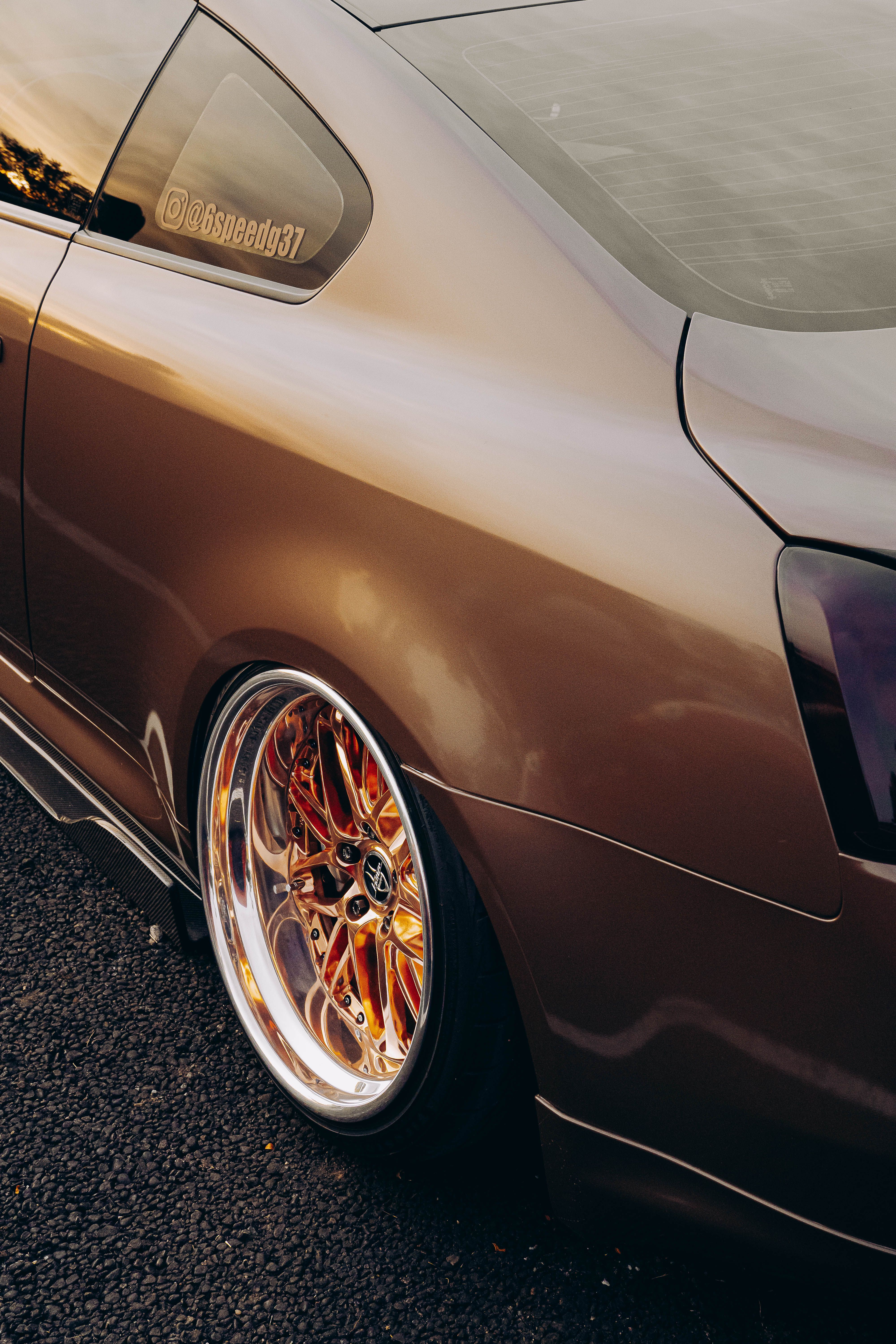Close-up of Brown Car with Custom Alloy Wheels · Free Stock Photo