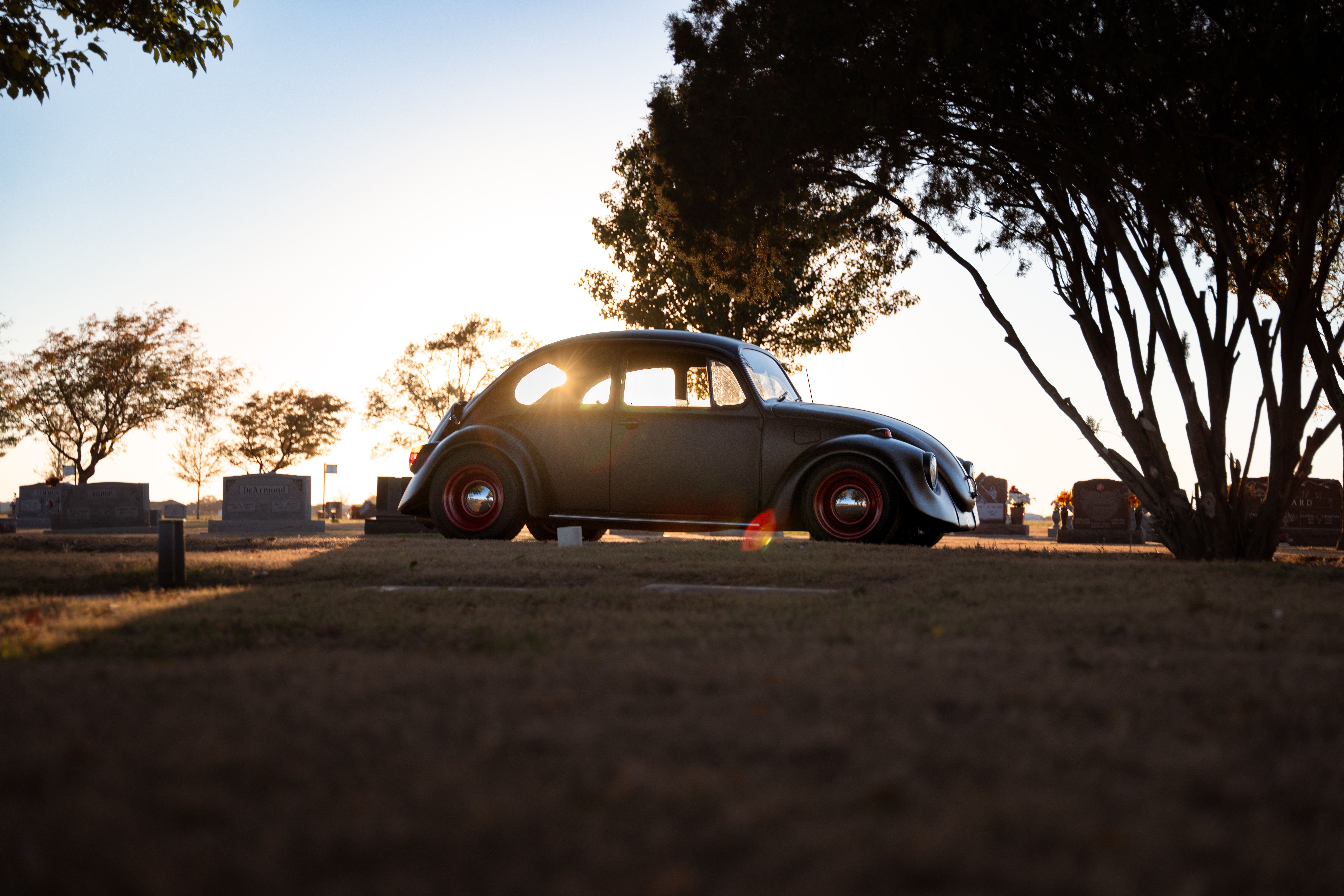 Vintage Beetle at Sunset in Quiet Cemetery · Free Stock Photo