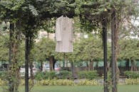 Traditional Kurta Hanging Outdoors Amidst Greenery