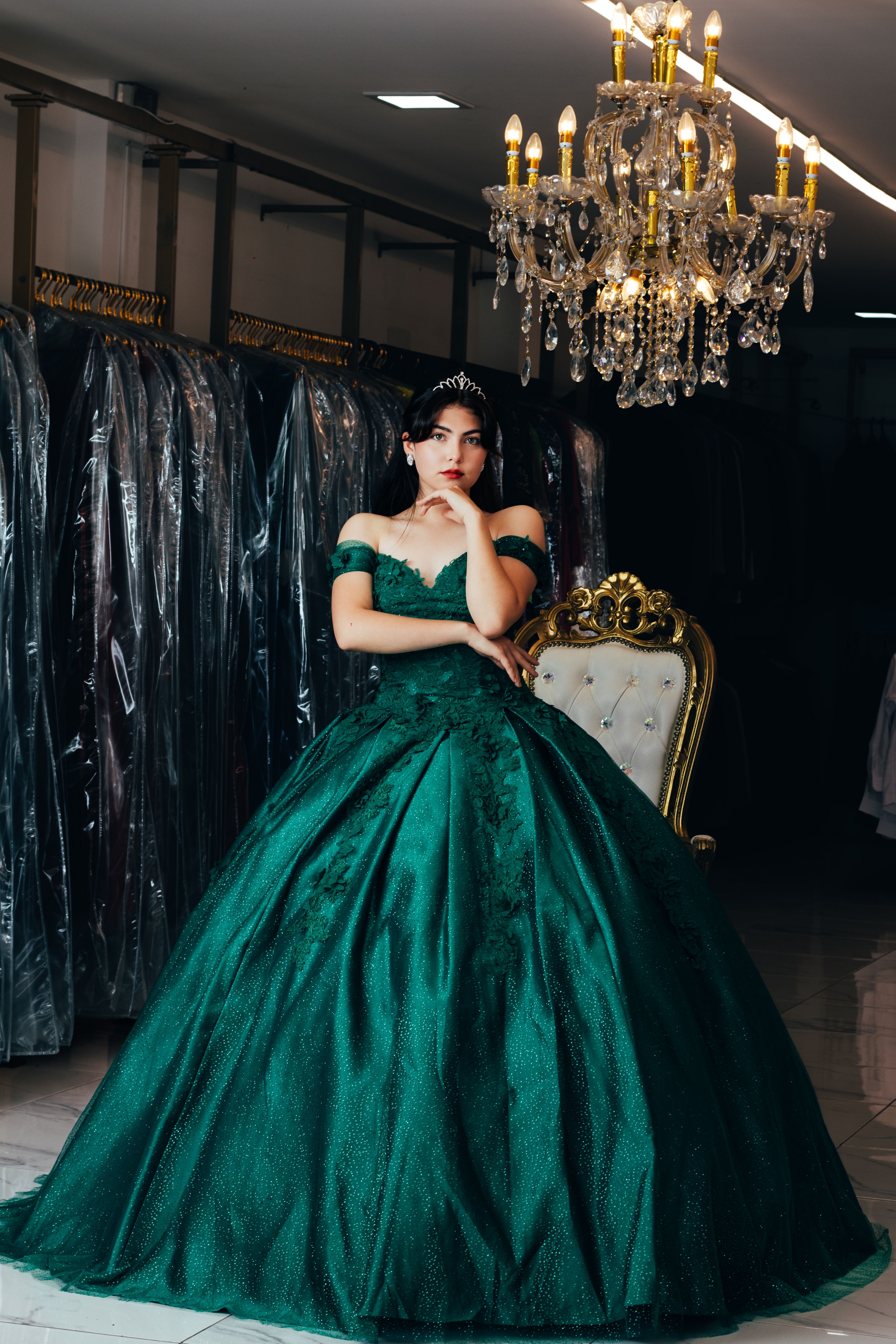 Elegant Green Evening Gown in Luxurious Setting · Free Stock Photo