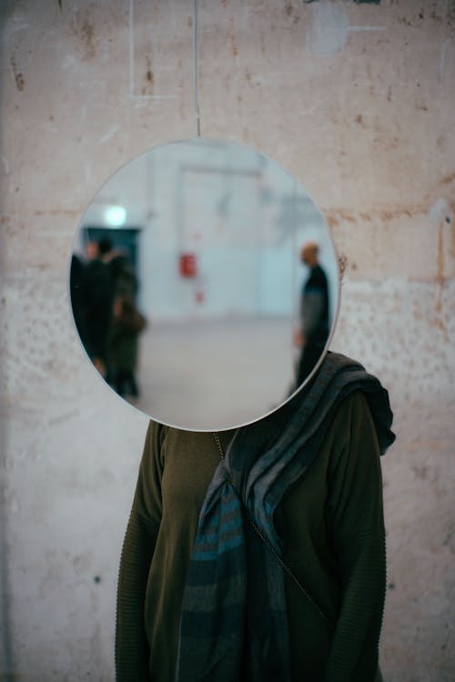 Mirror Covering Person Face