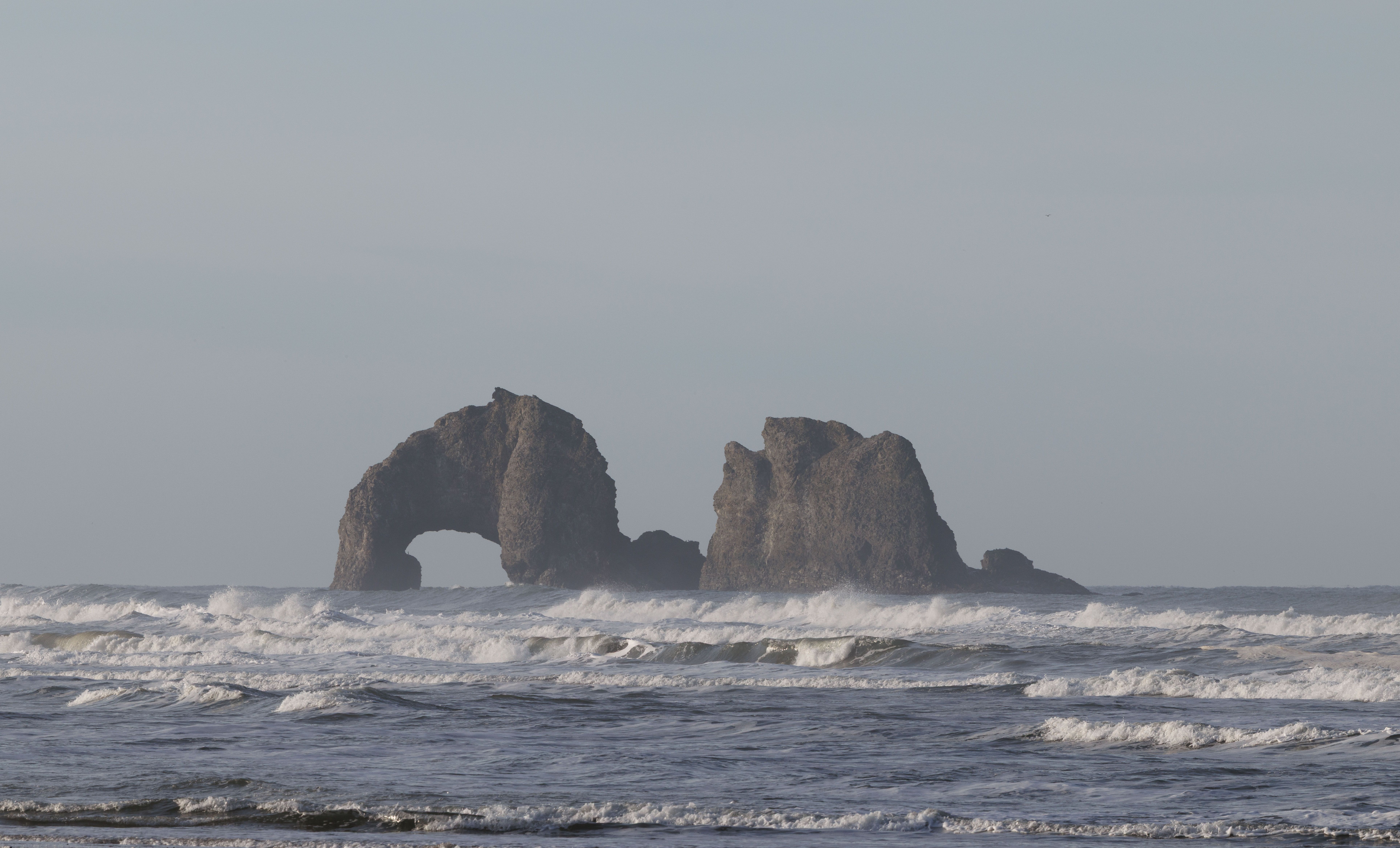 Scenic View of Pacific Ocean and Rock Formations · Free Stock Photo