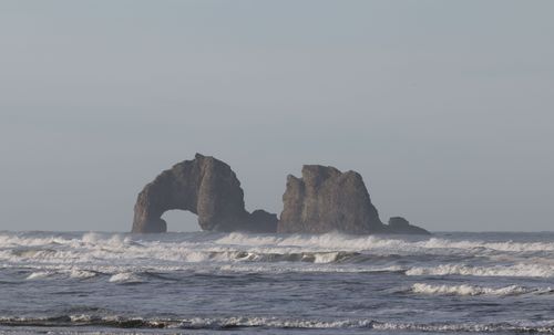Free Beautiful coastal rock formations with waves in the Pacific Ocean near Oregon. Stock Photo