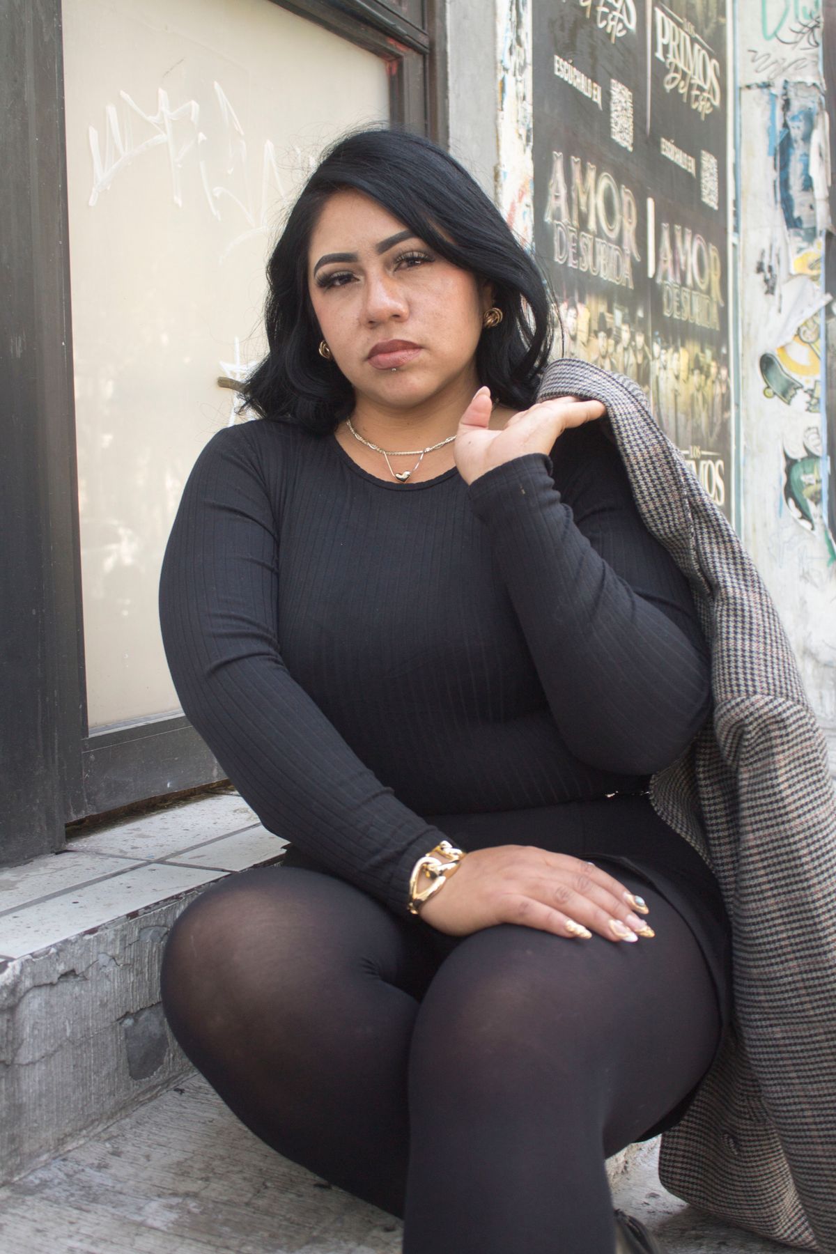 Latina woman styling a denim-on-denim double denim outfit
