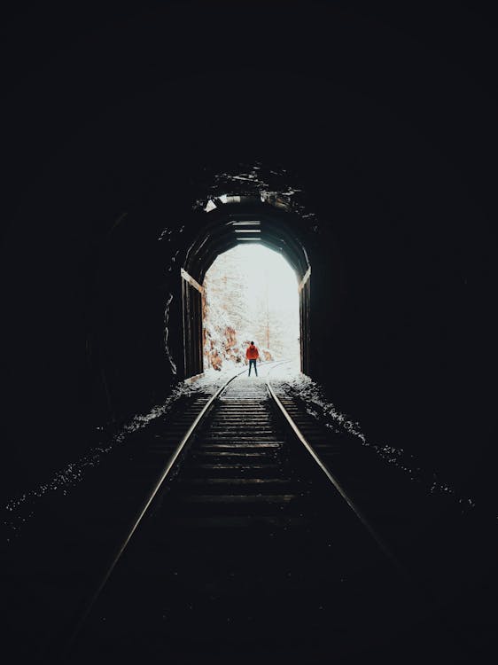 Free Person Standing on Train Track Stock Photo