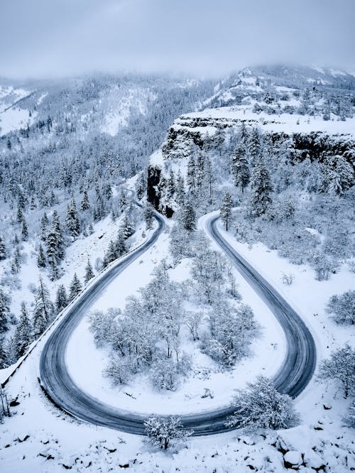 Bird's Eye View of Curved Road during Winter