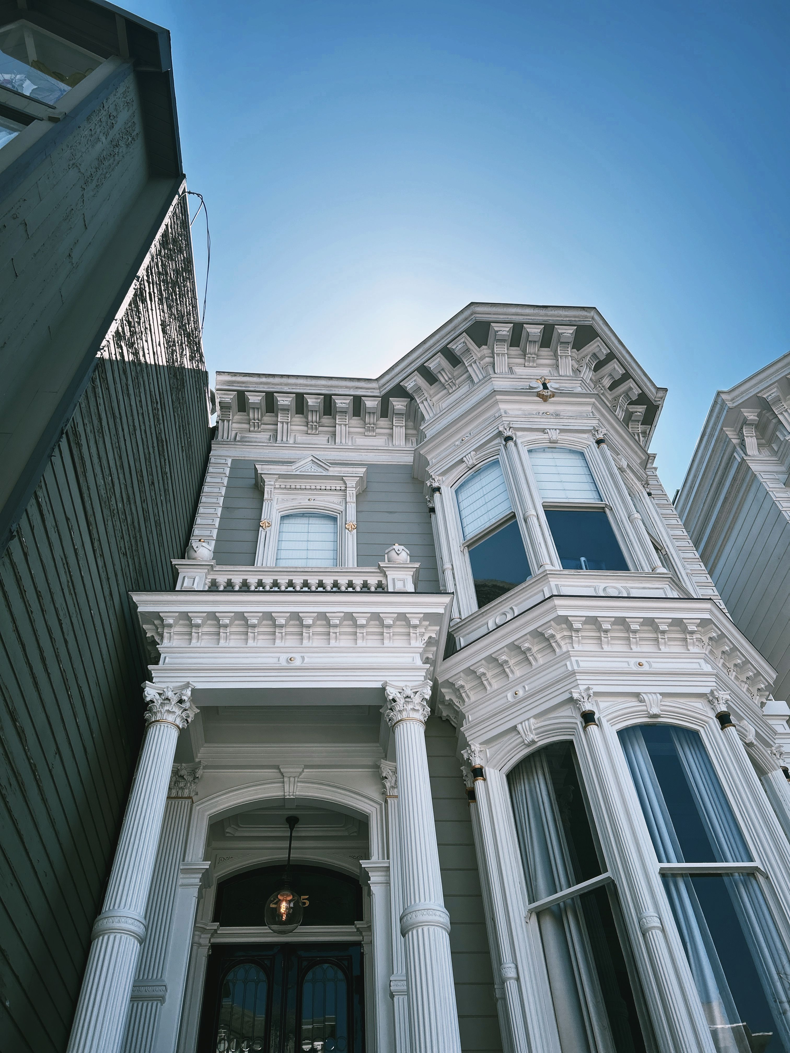 Elegant Victorian Architecture Under Blue Sky · Free Stock Photo