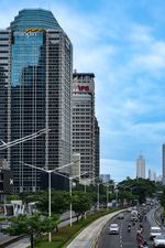 The Asymmetric Resilience: How Indonesia Defies the IMF's Global Tech-War Split