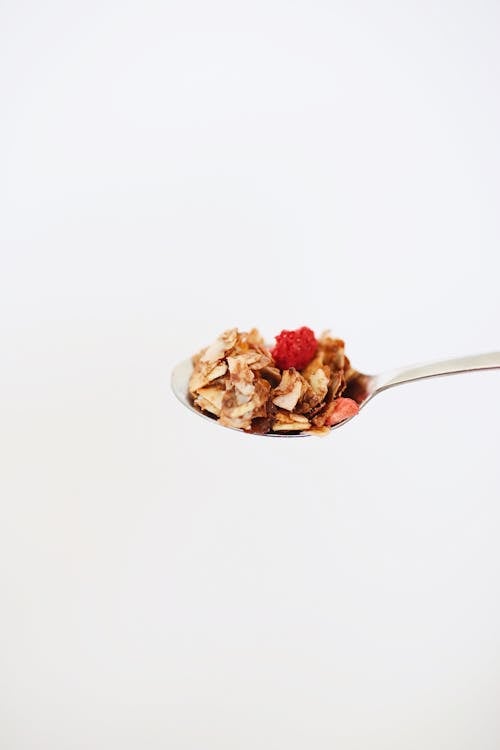 Close-Up Photo of Granola on Spoon