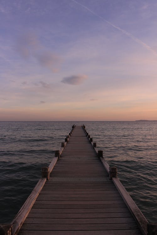 Free Brown Wooden Dock on Body of Water Stock Photo