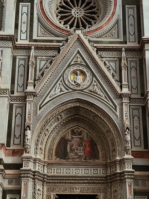 Free Close-up of intricate Gothic architecture on a cathedral facade in Florence, Tuscany. Stock Photo