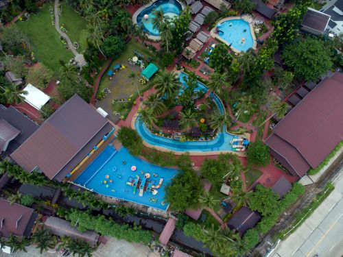 Free Stunning aerial view of a lush tropical resort with pools and palm trees in the Philippines. Stock Photo