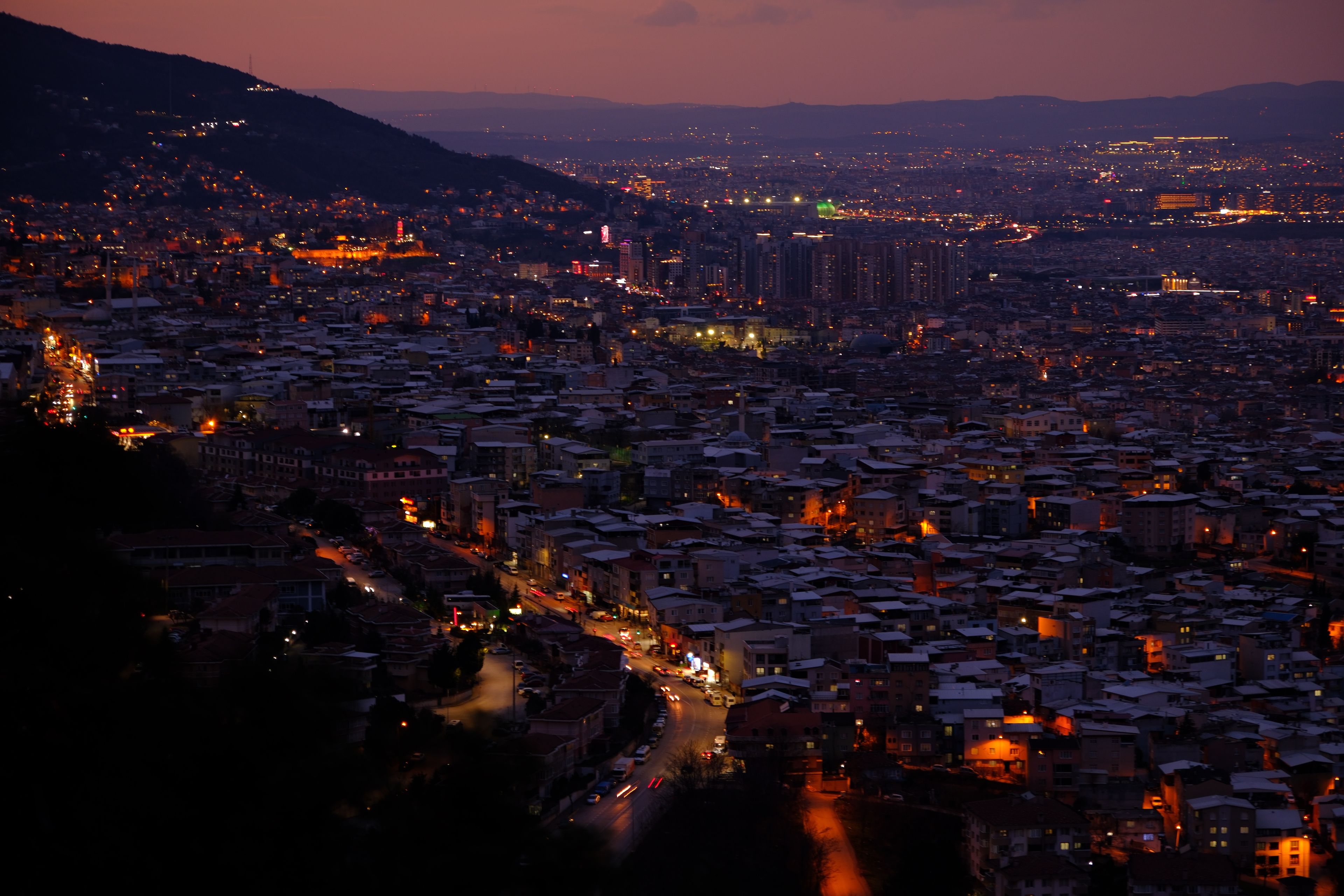 Aerial Dusk View of Urban Cityscape with Lights · Free Stock Photo