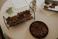 Homemade gingerbread cookies on a vintage holiday table setting, perfect for festive seasons.