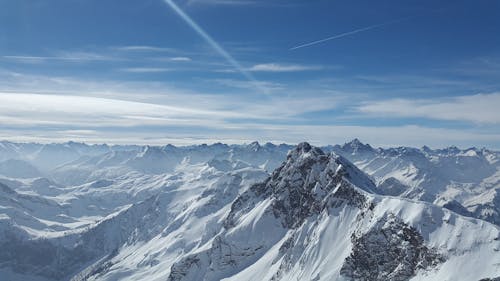 Bird's Eye View of Snow Coated Mountains