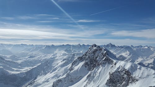 Free Bird's Eye View of Snow Coated Mountains Stock Photo