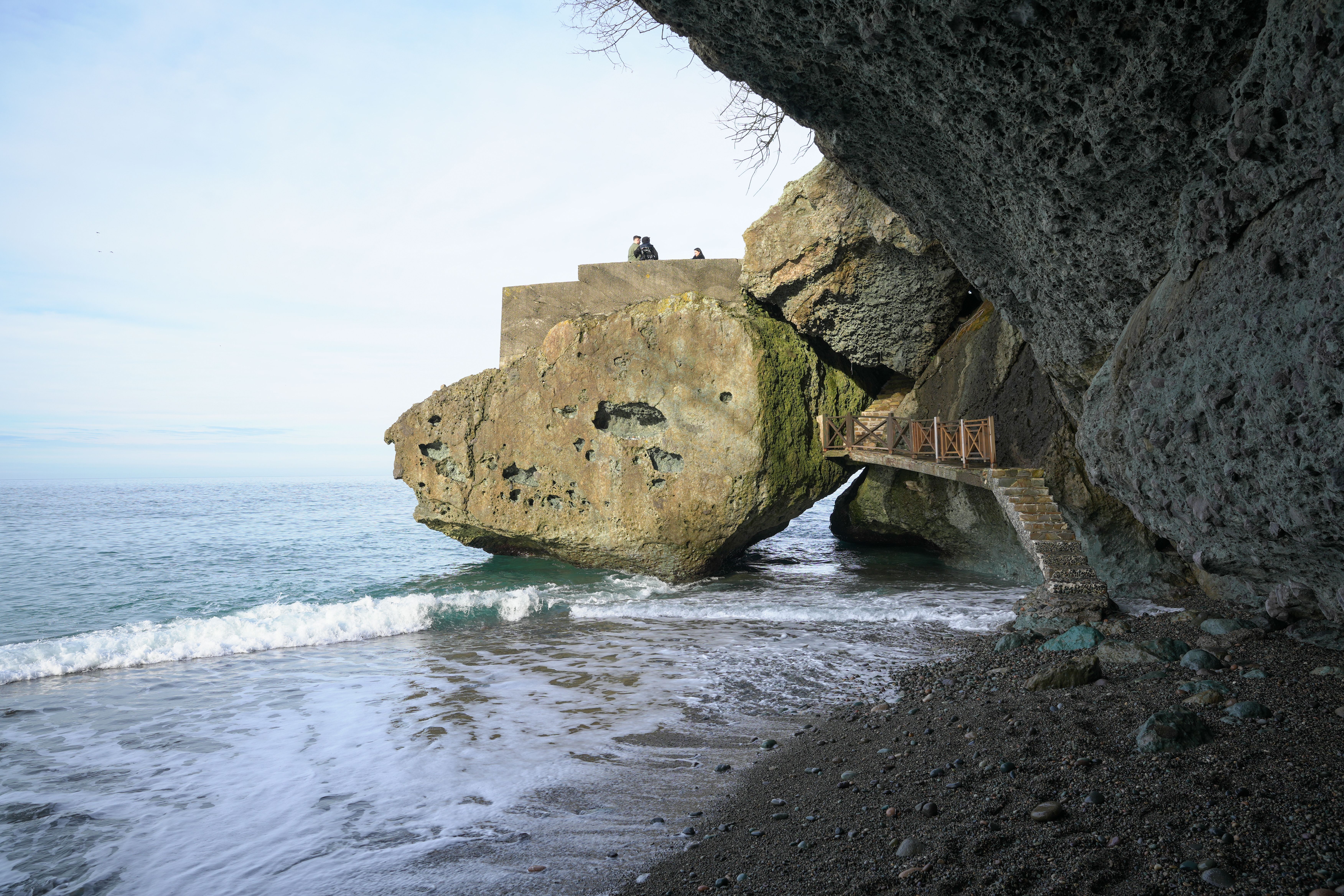 Scenic Coastal Rock Formation with Walkway · Free Stock Photo
