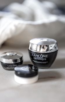 Elegant display of Lancome Genifique skincare products for a luxurious feel.