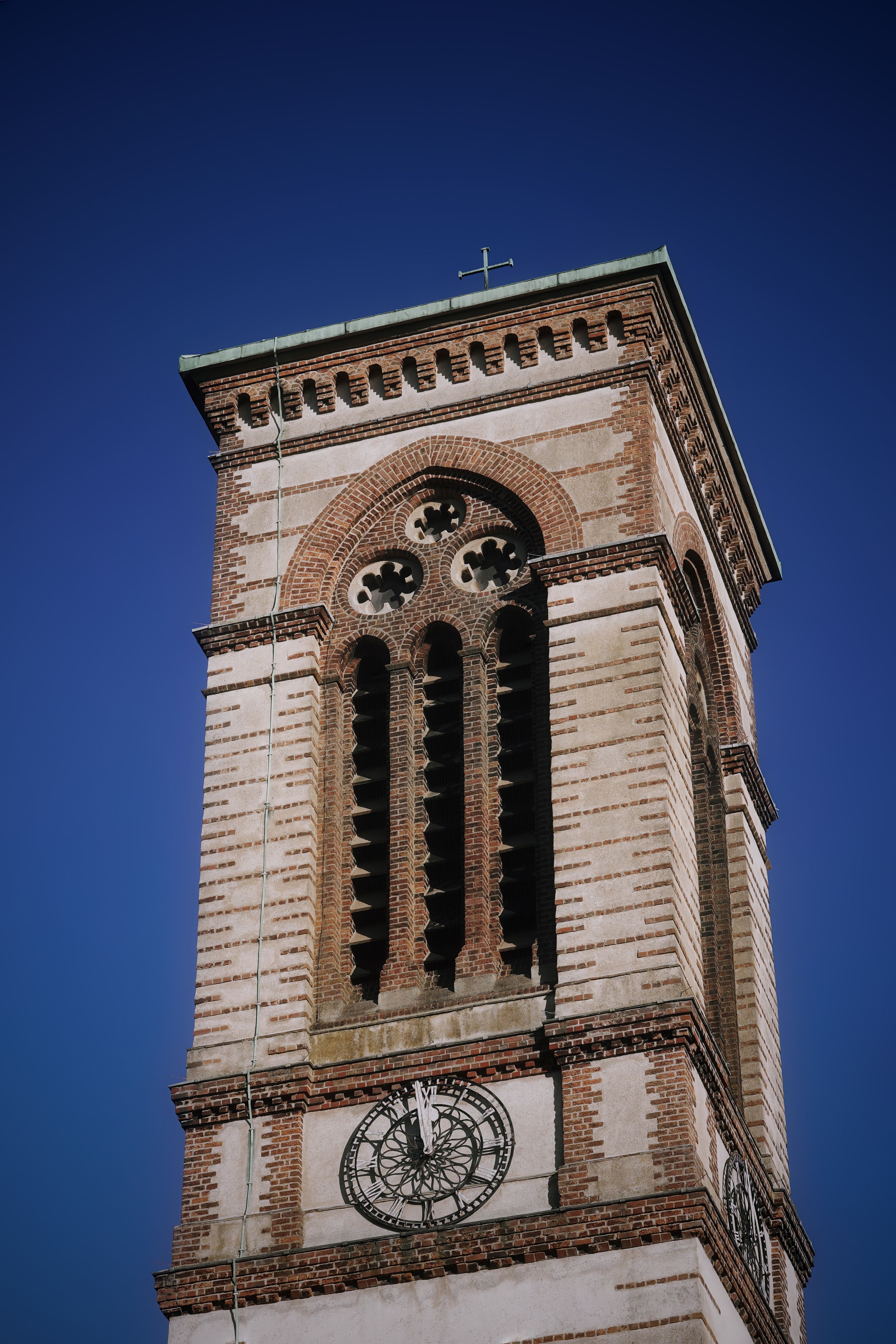 Historic Church Bell Tower Against Blue Sky · Free Stock Photo