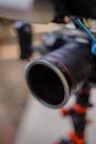 Close-Up of a Professional Camera Lens on Tripod