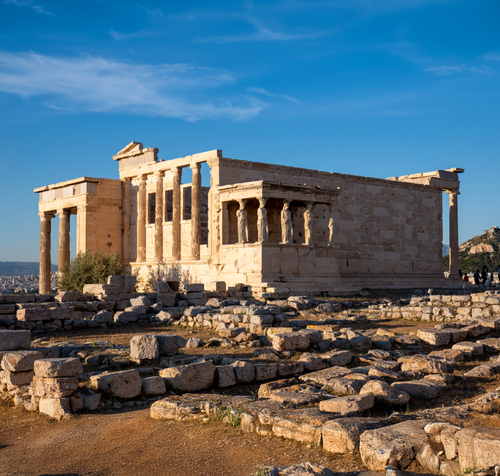 Free Erechtheion Temple at Acropolis, Athens, showcasing ancient Greek architecture under a bright sky. Stock Photo