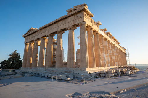 Free Iconic view of the Parthenon under a bright blue sky in Athens, Greece. Stock Photo