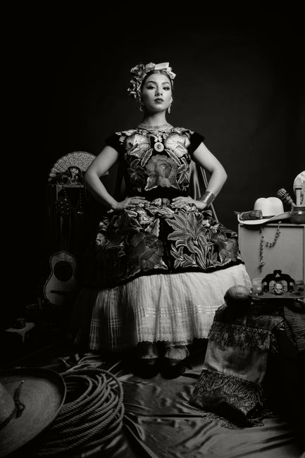 Elegant black and white portrait showcasing traditional Mexican attire and cultural heritage.