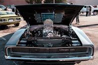 Vintage Car Hood Open at Auto Show