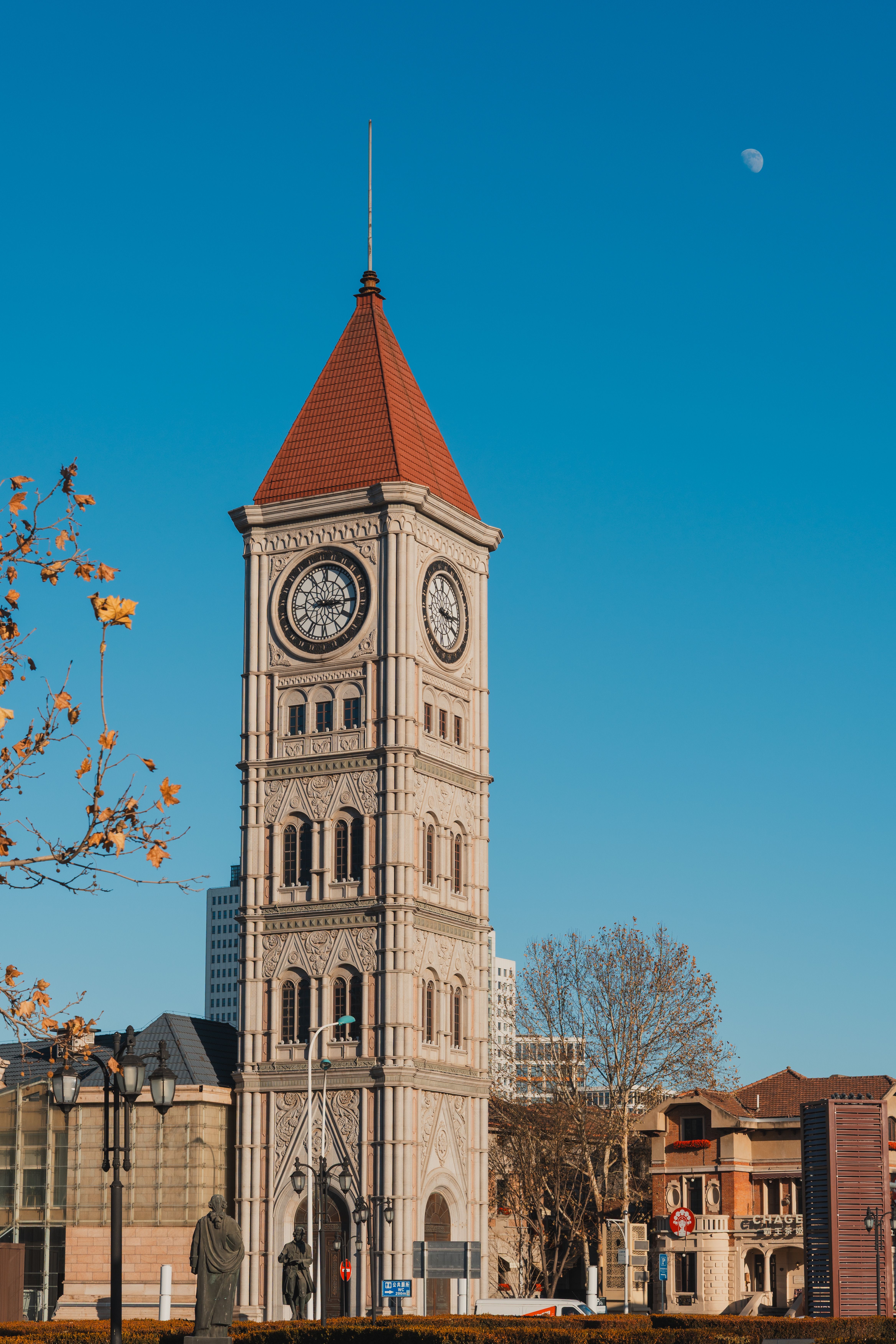 Historic Clock Tower Against Clear Blue Sky · Free Stock Photo