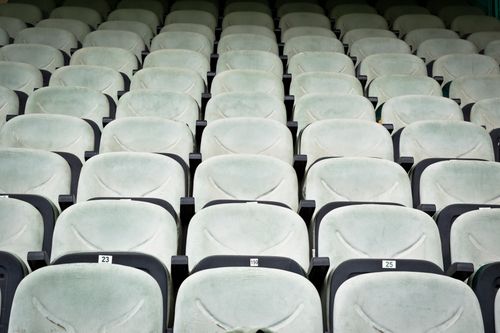 Free Rows of empty white seats in a cinema, perfect for concepts like solitude or seminar setups. Stock Photo