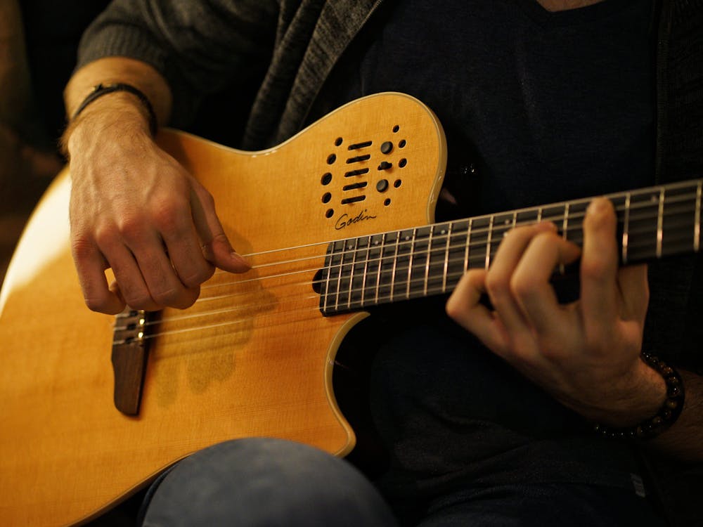 Free Brown Acoustic Guitar Stock Photo