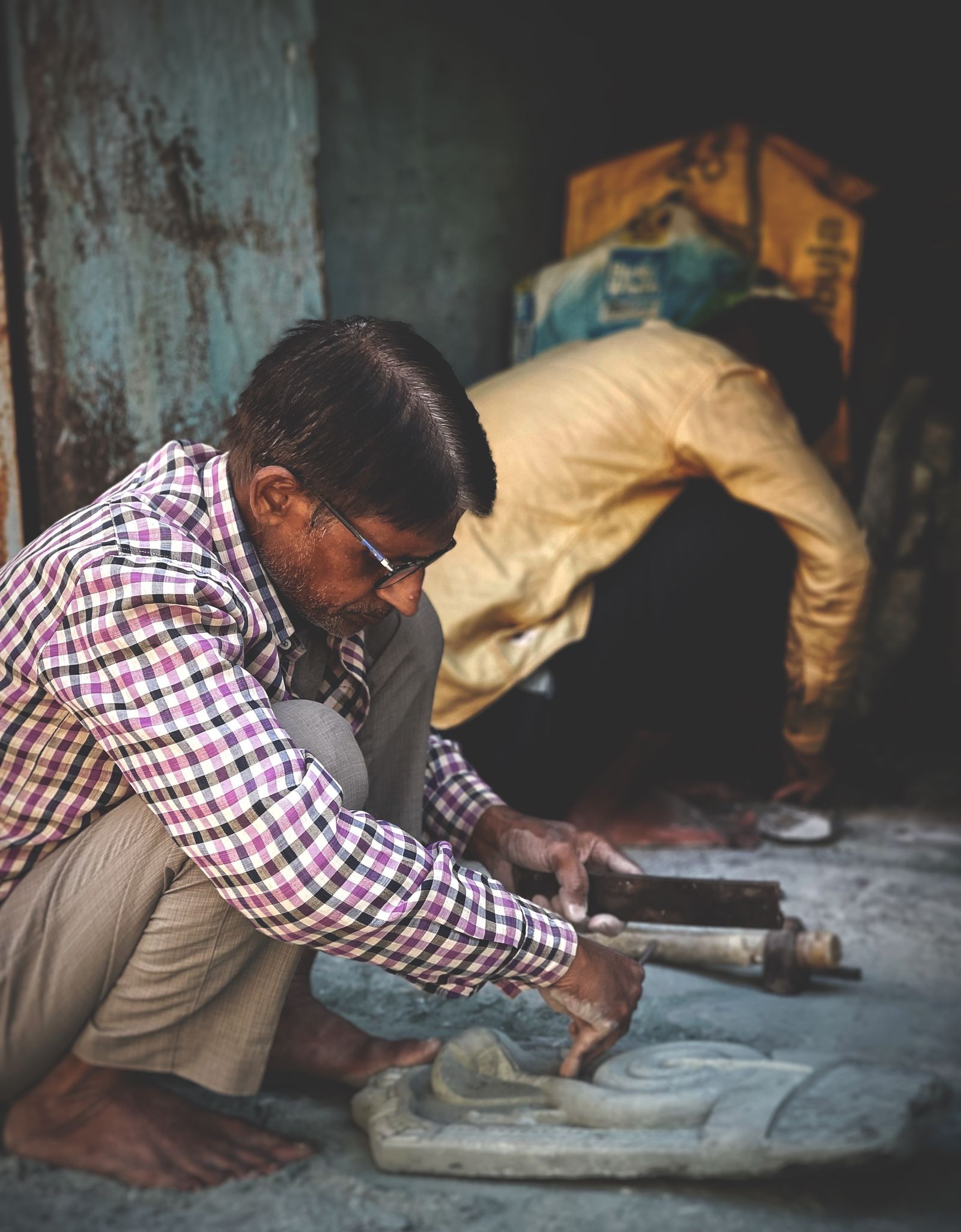 Indian stone artisan in Udaipur