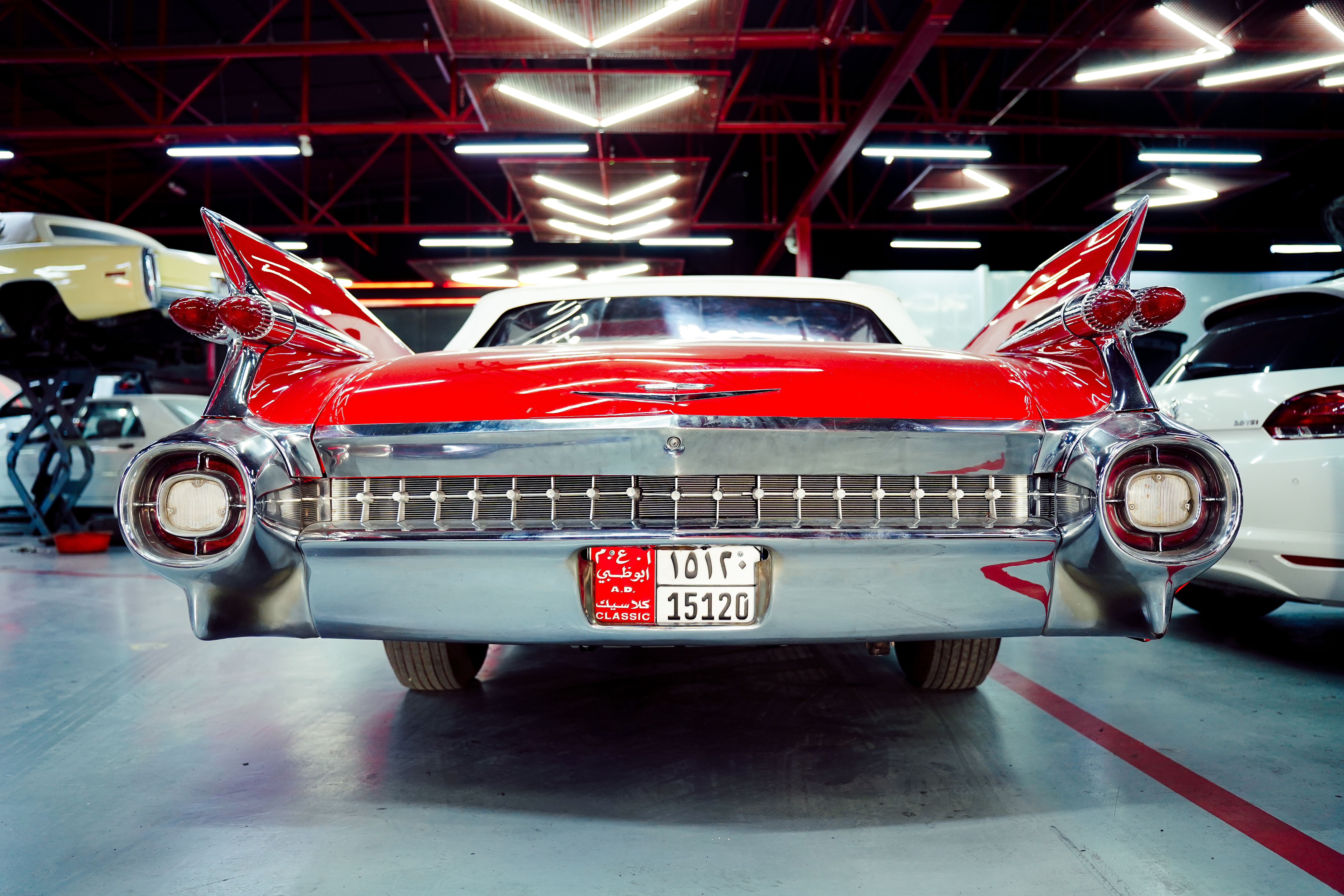 Vintage Classic Car in Indoor Garage Setting · Free Stock Photo