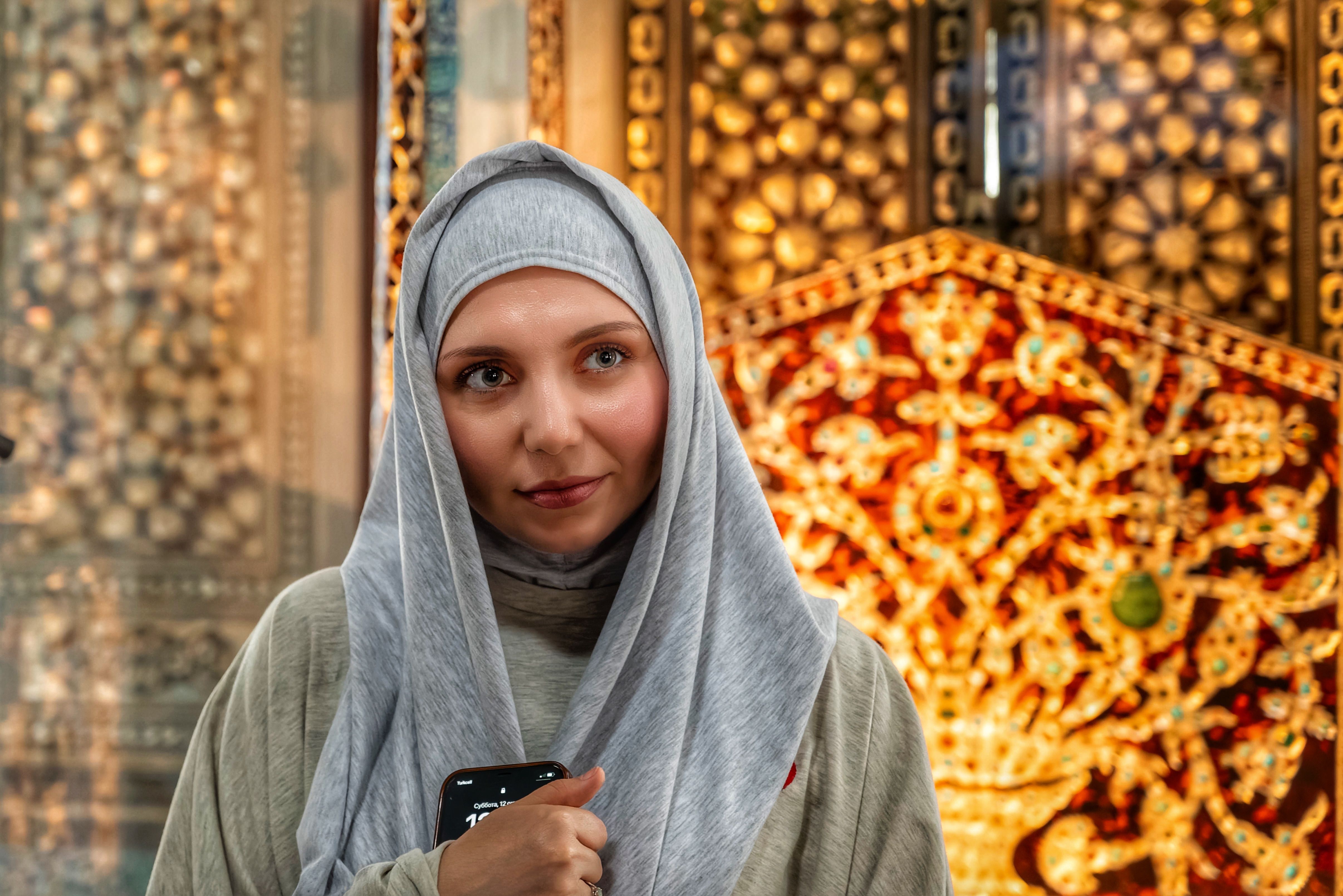 woman-in-hijab-against-ornate-background-free-stock-photo