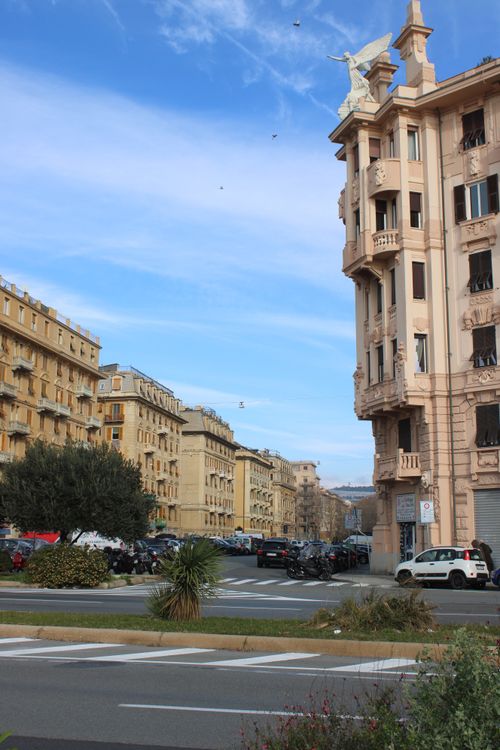 Free Charming view of historic buildings and streets in Genoa, Italy during winter. Stock Photo