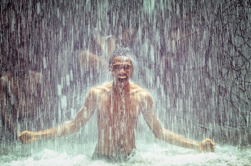 Free Topless Man in Stagnant Water Stock Photo