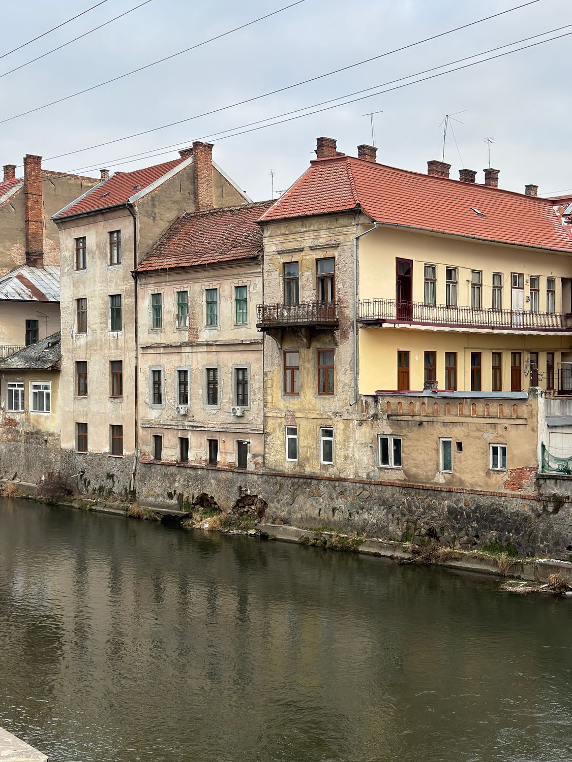 Iconic Riverside Building Historic European Riverside Buildings with Reflection · Free Stock Photo