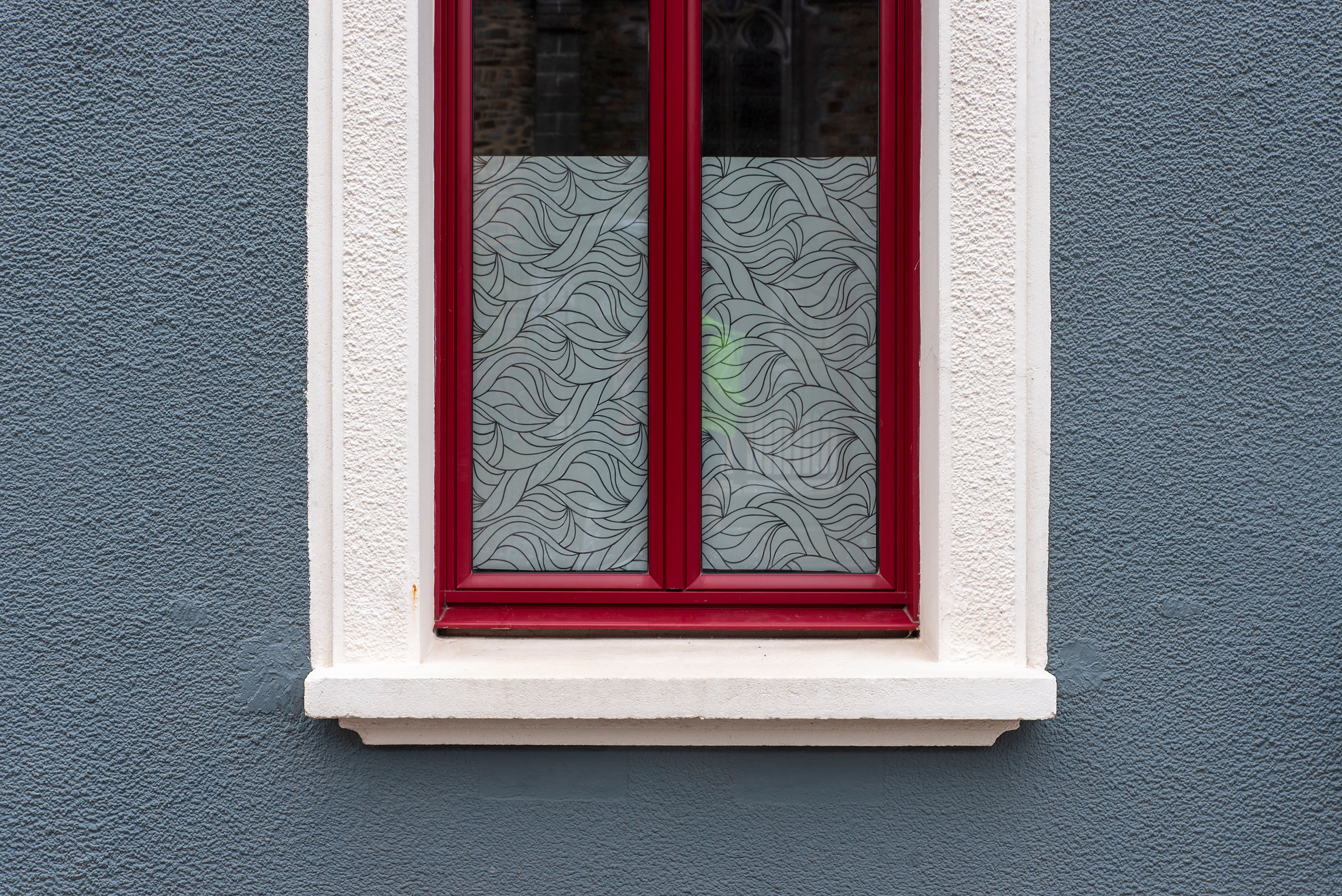 Elegant Red Window on Blue Textured Wall · Free Stock Photo