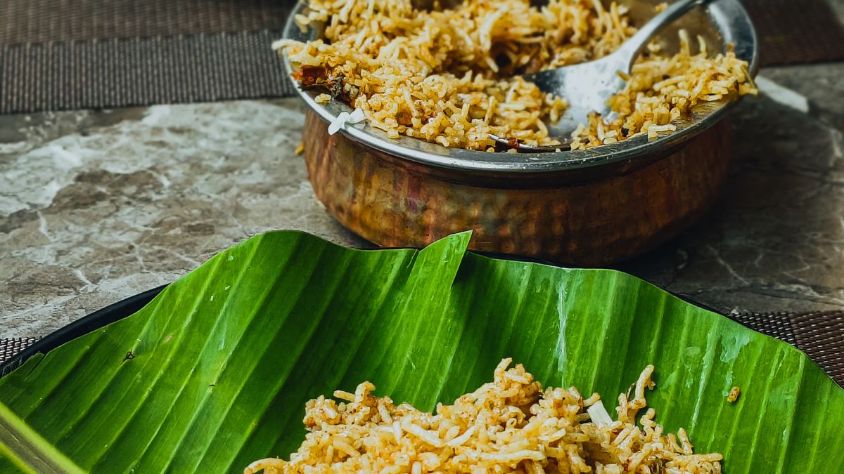 Biryani served on banana leaves with boiled egg (Andhra Catering in Vellore)