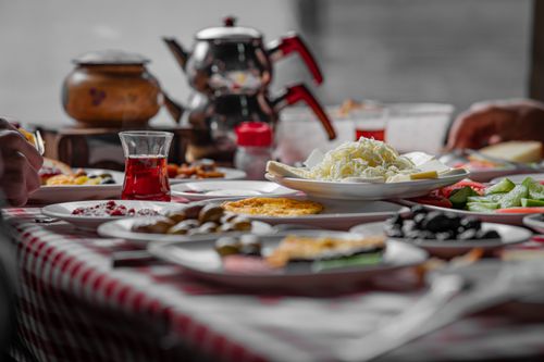 Free A vibrant spread of traditional Turkish breakfast featuring tea and various dishes, captured in Bursa, Türkiye. Stock Photo
