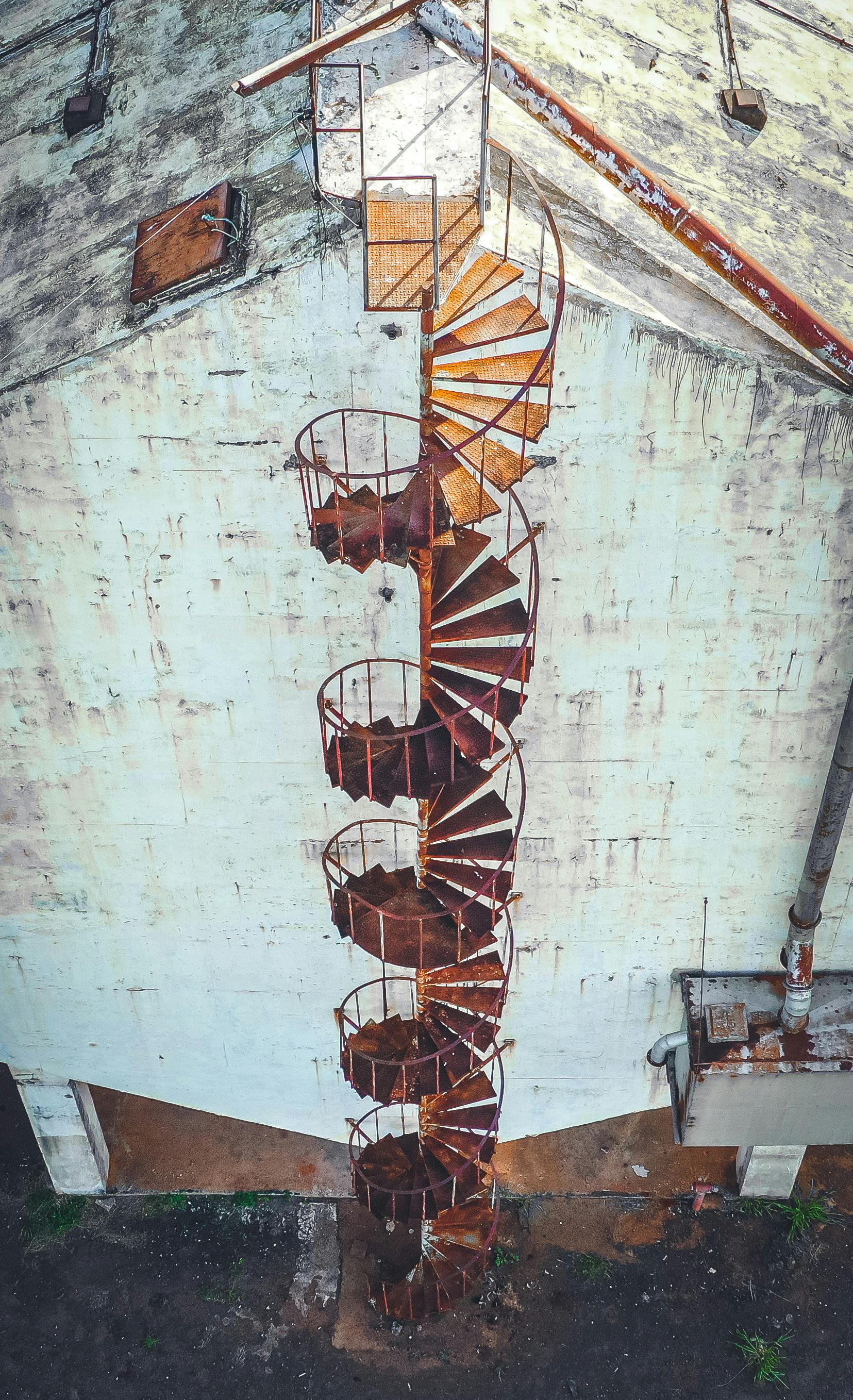 Photo of a Smiling Baby in a Crib with stuffed teddy bear