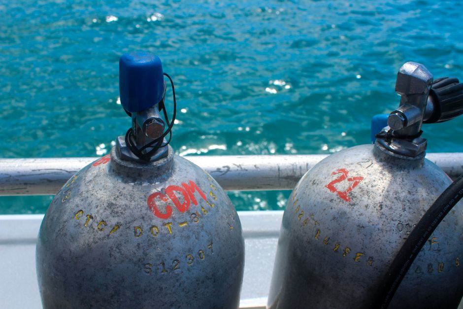 A dive boat in the Maldives equipped with safety gear, highlighting safe diving practices.