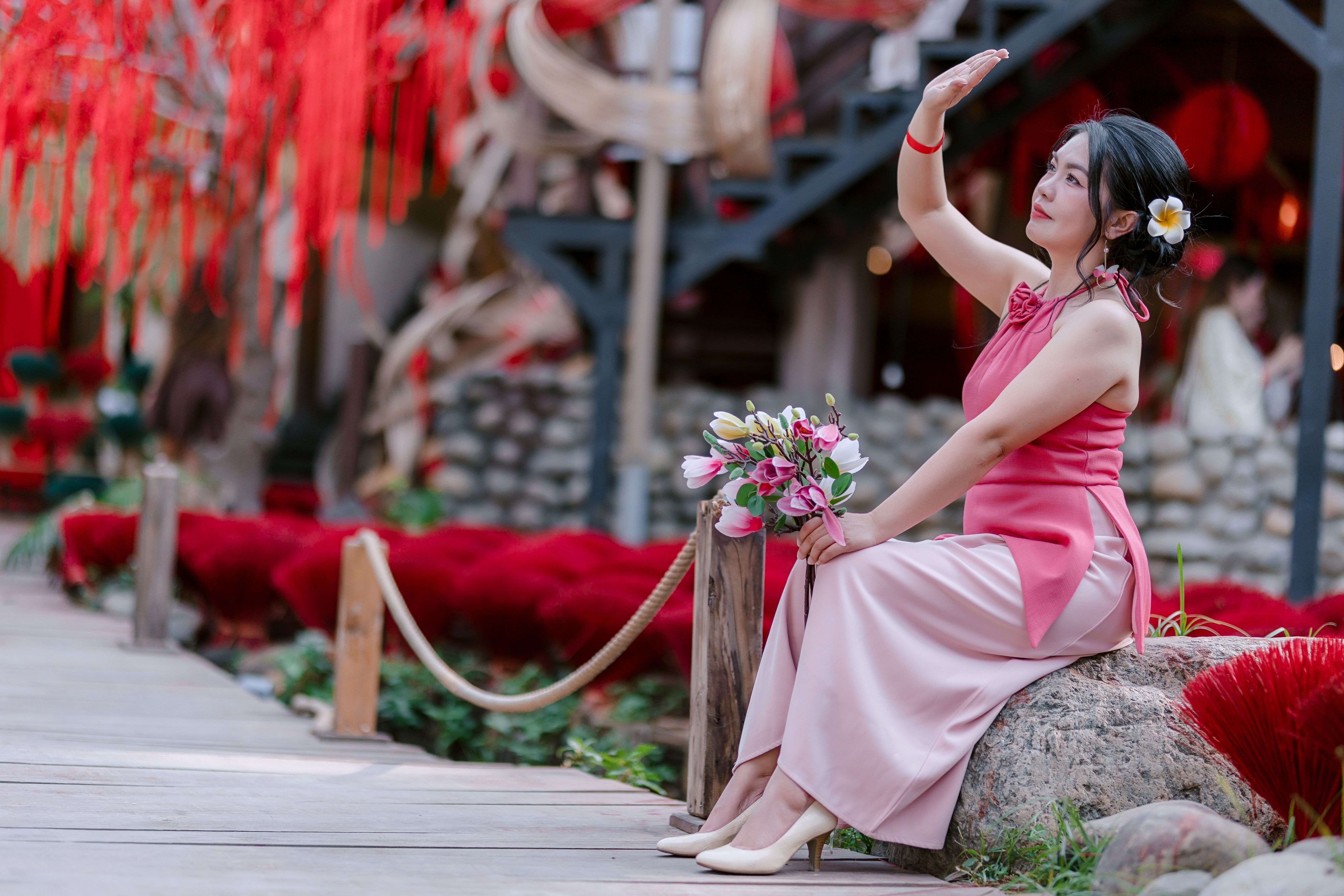 Elegant Woman in Pink Dress Posing Indoors · Free Stock Photo